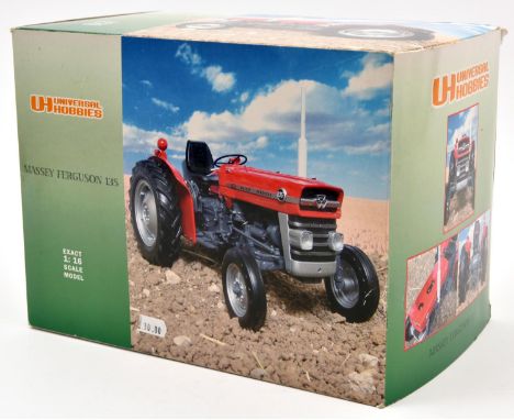 Universal Hobbies 1:16 scale Massey Ferguson 135 tractor. In bright red and grey livery, with silver wheels.Boxed, with packi