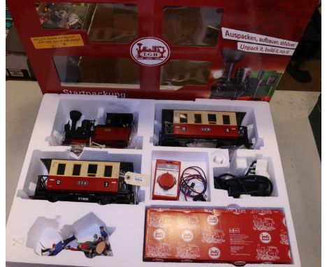 A G scale garden railway LGB train set, Starter Set (70302). Comprising an 0-4-0T locomotive in maroon and black, 2x 4-wheel 