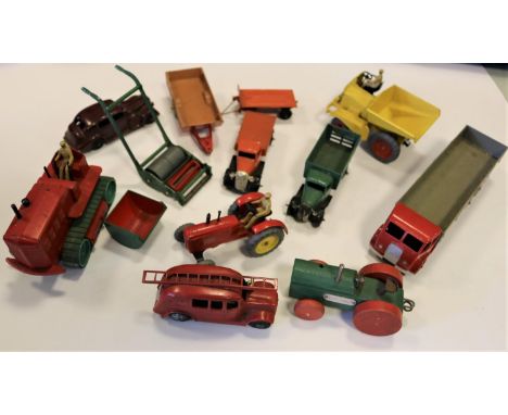 11 Dinky Toys. Foden DG in red with silver flash and grey rear body. Streamlined Fire Engine, with red ladder and bell. Masse