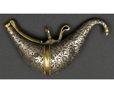 A Persian powder flask, Qjar dynasty, 15cms, bird shaped tinned brass body applied with a geometric design of pierced sheet s