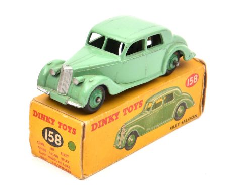 Dinky Toys Riley Saloon (158). Example in light green with mid green wheels. Boxed, some wear/damage. Vehicle VGC minor wear.