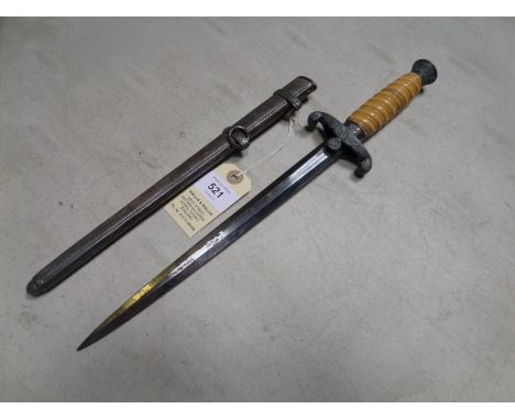 A Third Reich Army officer's dagger,  by WKC Solingen, the hilt with grey metal mounts, the crosspiece engraved with the owne