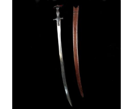 An Indian sword tulwar.  2nd half of the 19th century, curved SE blade 74cms cut with twin narrow fullers, iron hilt of conve