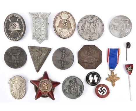 Third Reich badges,  hollow black wound badge (pin hook missing), solid back silver wound badge, NSDAP enamelled membership b