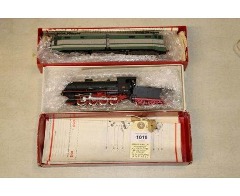 2 Rivarossi HO scale locomotives. An Italian FS 0-8-0 tender locomotive RN 740050 (11145) in matt black with red frames and w