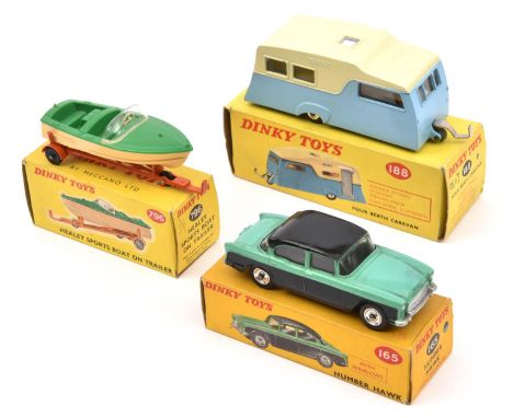 3 Dinky Toys. Humber Hawk (165). Example in mid green and black with black roof panel and spun wheels. Four Berth Caravan (18