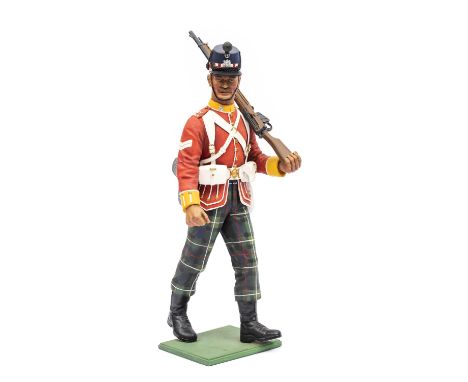 A Stadden figure: Corporal Highland Light Infantry shouldering  rifle, 10" high. VGC Plate 4 