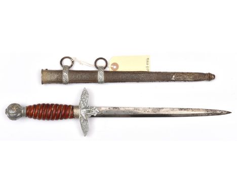 A Third Reich 2nd pattern Luftwaffe officer's dagger,  with unmarked blade, the hilt having dark orange grip, in its sheath. 