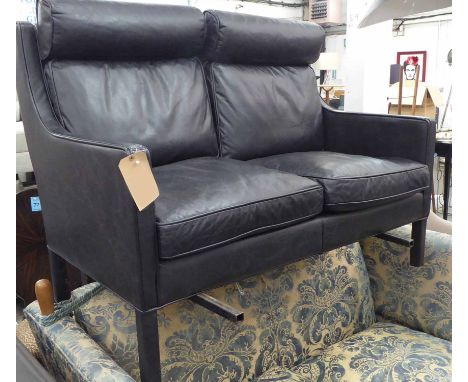 SOFA, two seater, black leather on square supports, 132cm L x 93cm H.