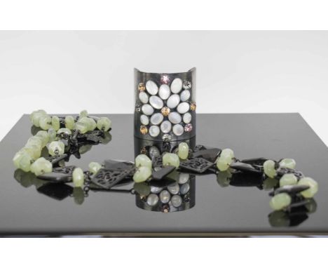 MOTHER OF PEARL AND GEM SET BANGLE, Philippe Ferrandis Paris, Eleonor Cantacuzone Paris black and green necklace. 