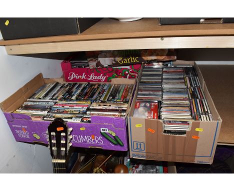 FOUR BOXES OF DVDS, CDS AND AN ACCOUSTIC GUITER, included a Hohner guitar model MC - 05, approximately two hundred plus DVDs 