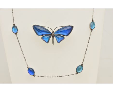 A WHITE METAL BUTTERFLY WING BROOCH AND NECKLACE, the brooch in the form of a butterfly, fitted with a brooch pin and C clasp