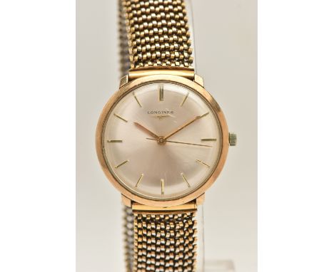 A GENTS 9CT GOLD ‘LONGINES’ WRISTWATCH, manual wind, round silvered dial signed ‘Longines’, baton markers, within a polished 