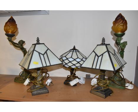A GROUP OF TABLE LAMPS, comprising a pair of small modern table lamps, with cream leaded glass style shades  (tiny losses to 