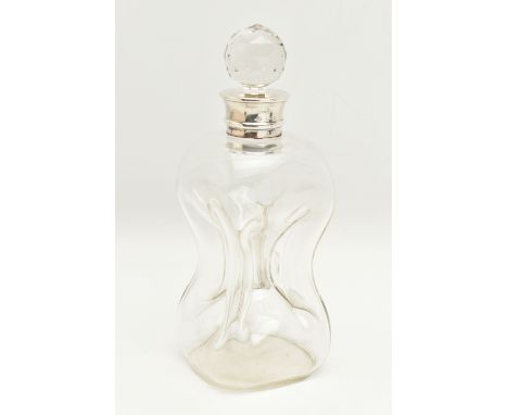 AN EARLY 20TH CENTURY HOURGLASS DECANTER, fitted with a silver collar, makers mark 'Hukin &amp; Heath Ltd' Birmingham 1912, t