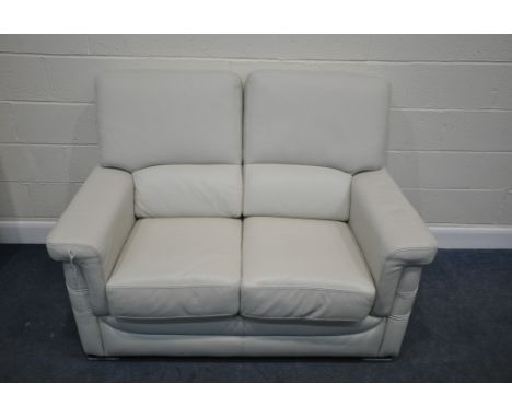 A CREAM LEATHER TWO SEATER SOFA, length 143cm x depth 93cm x height 104cm, condition report: could use a slight clean, other 