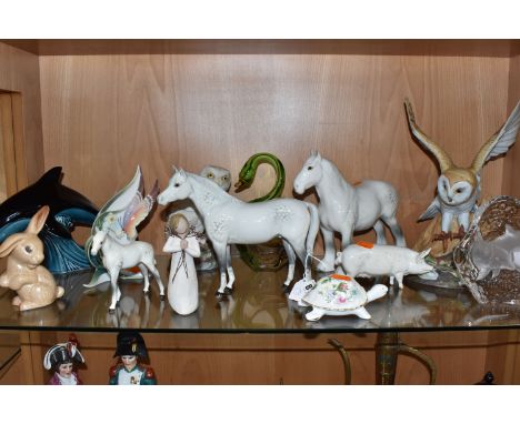 A GROUP OF FIGURINES to include three white Beswick horses comprising an 'Arab Bahram' No. 1771, a 'Shire Mare' No. 818, and 