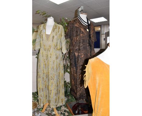 THREE 1920'S/1930'S VINTAGE DRESSES, comprising a black silk dress with copper coloured machine embroidered abstract detailed