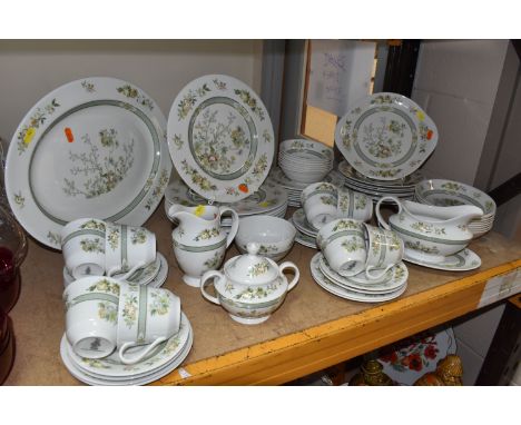 SEVENTY PIECE ROYAL DOULTON DINNER AND TEAWARE SET 'TONKIN', pattern no. TC1107, comprising a large oval meat plate, cake pla