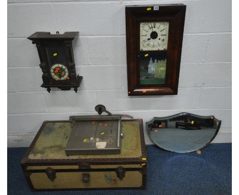 A VINTAGE TRAVELLING TRUNK, width 91cm x depth 51cm x height 33cm, two wall clocks, a guillotine, and a mirror, condition rep