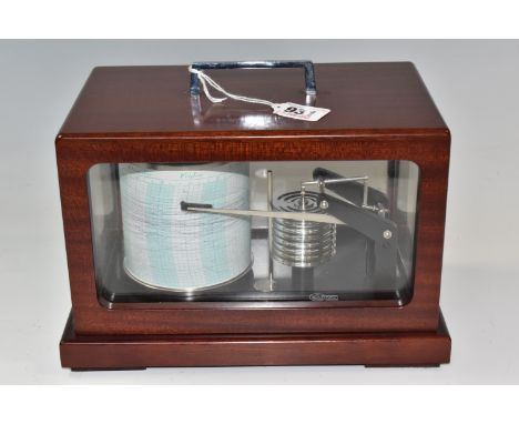 A BARIGO BAROGRAPH, mechanic barograph operated by a battery  quartz clockwork inside the metal drum, writing arm to attach a