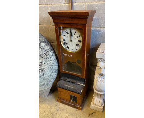A late 19th / early 20th century National Time Recorder oak cased clocking in machine, height 109cm
