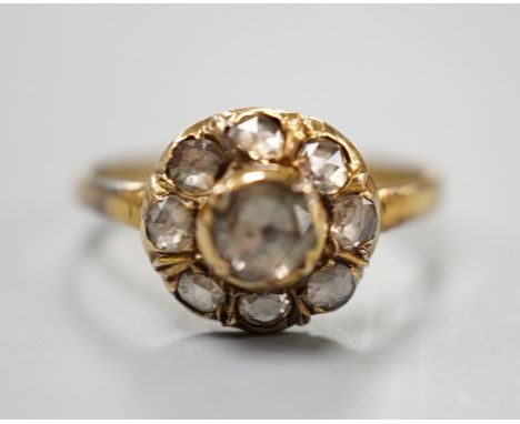 An antique yellow metal and rose cut diamond cluster set ring, size K/L, gross weight 3.2 grams.