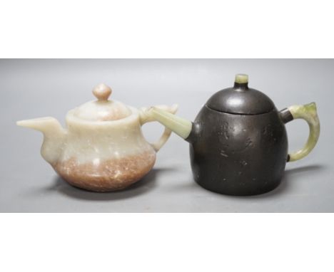 A Chinese jade wine pot and a Yixing pewter and bowenite jade mounted tea pot (2)