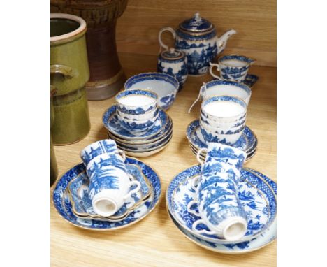 A Caughley blue and white fluted part tea and coffee service, c.1780, each piece printed in blue and gilt decorated, ‘S’ and 