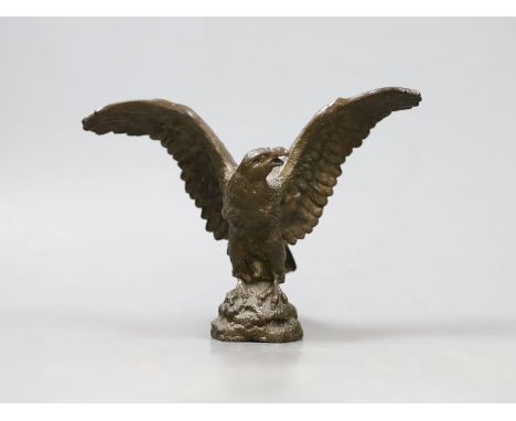 A bronze figure of an eagle with wings spread, 10cm high