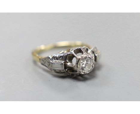 An 18ct, plat and solitaire diamond ring, size M/N, gross weight 3.8 grams, the stone weighing approx. 0.35ct.