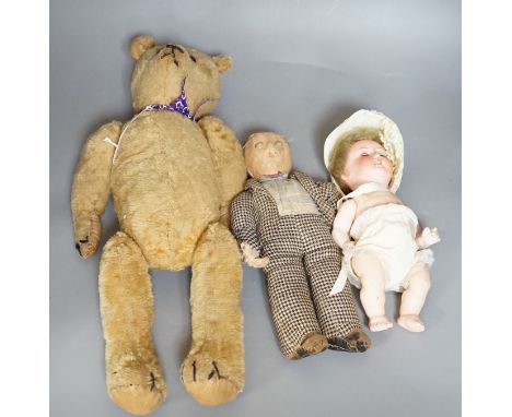 A plush teddy bear a cloth male doll and a bisque headed Armand Mareseille  open mouthed doll, doll 23cms high