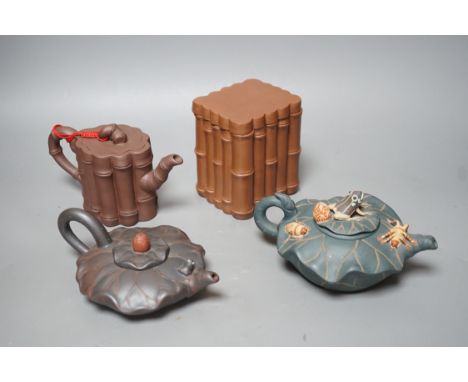 Three Chinese Yixing teapots and a tea caddy