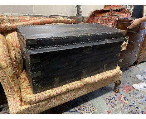 A Victorian studded black leather trunk, brass plaque inscribed Mr J Evans No. 2, width 107cm, depth 55cm, height 52cm