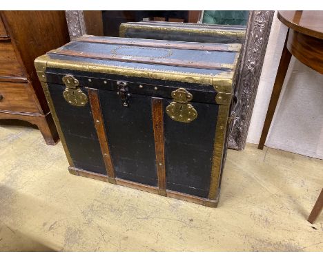 A Victorian brass and oak mounted black leather travelling trunk, length 75cm, depth 36cm, height 62cm