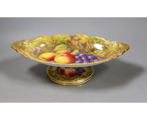 A Royal Worcester fruit painted footed dish, c. 1930, by T. Lockyer. 32cm wide