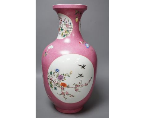 A large Chinese famille rose ruby ground vase, seal mark, 42cm