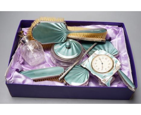 A George V silver and green guilloche enamel set nine piece dressing table set, by Albert Carter, Birmingham, 1933/4, togethe