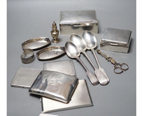 Mixed silver or white metal items including two cigarette boxes, three cigarette cases, cutlery, condiment and a napkin ring,