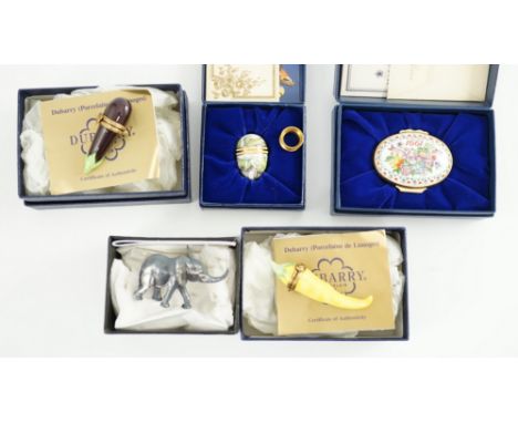 Two Halcyon Days enamel boxes; frog and 1991, two Dubarry boxes and a white metal model elephant, all boxed.