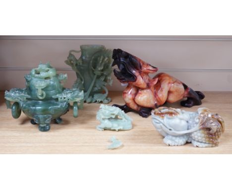 Four Chinese bowenite jade carvings - two mythical beasts, a censer and cover and a ‘dragon’ vase and cover, largest 28cm lon