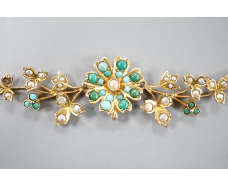 A 375 yellow metal, seed pearl and turquoise cluster set necklace, with rope twist chain, 37.5cm, gross weight 7 grams, lacki