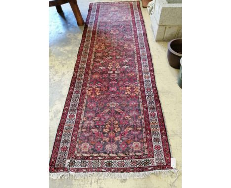 A North West Persian blue ground runner, 304 x 96cm