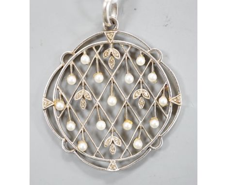 An early 20th century white metal, rose cut diamond chip and seed pearl set openwork pendant, diameter 31mm, gross weight 5.5