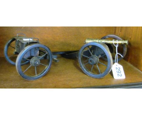 A wooden and brass model cannon and ammunition trailer