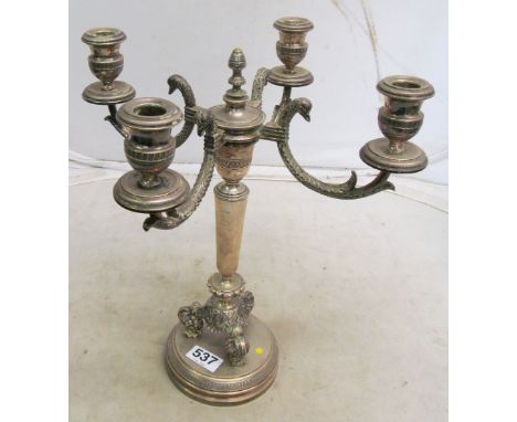 A silver-plated four branch candlestick
