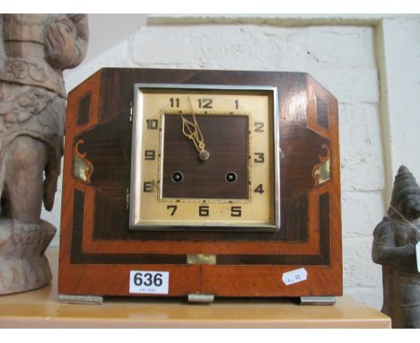 An Art Deco clock (missing glass)