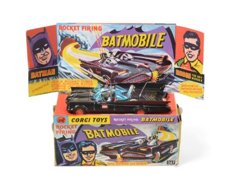 Corgi 267 Batmobile in display box with leaflet, nine missiles on sprue and lapel badge; with two pieces of card packaging (E
