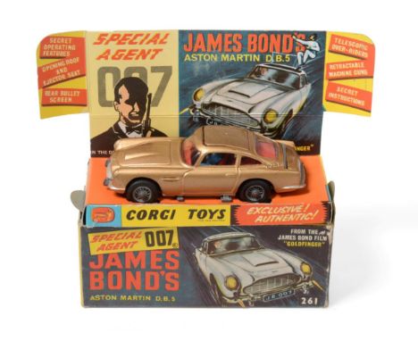 Corgi 261 James Bond Aston Martin DB5 in display box with leaflet, spare man and lapel badge (E-G box G)