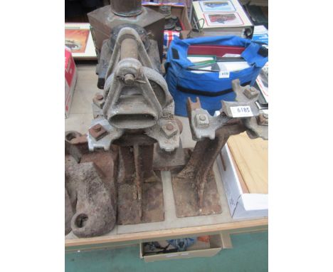 A pair of trackside telegraph/signal wire roller stands and smaller stand